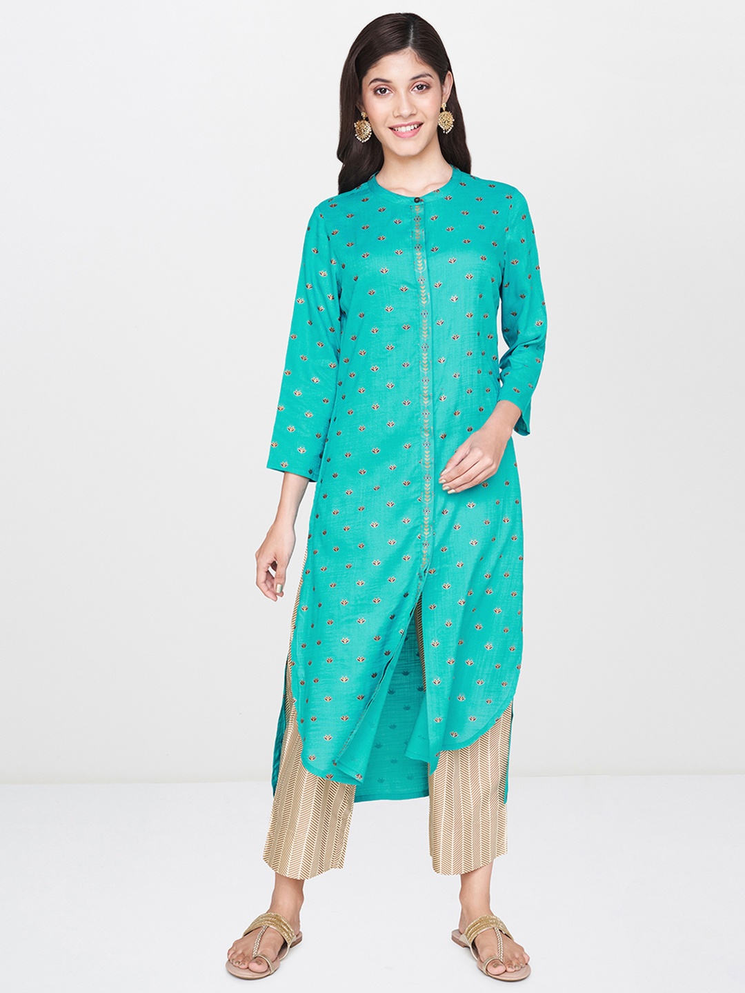 

Global Desi Women Turquoise Blue Printed Straight Kurta