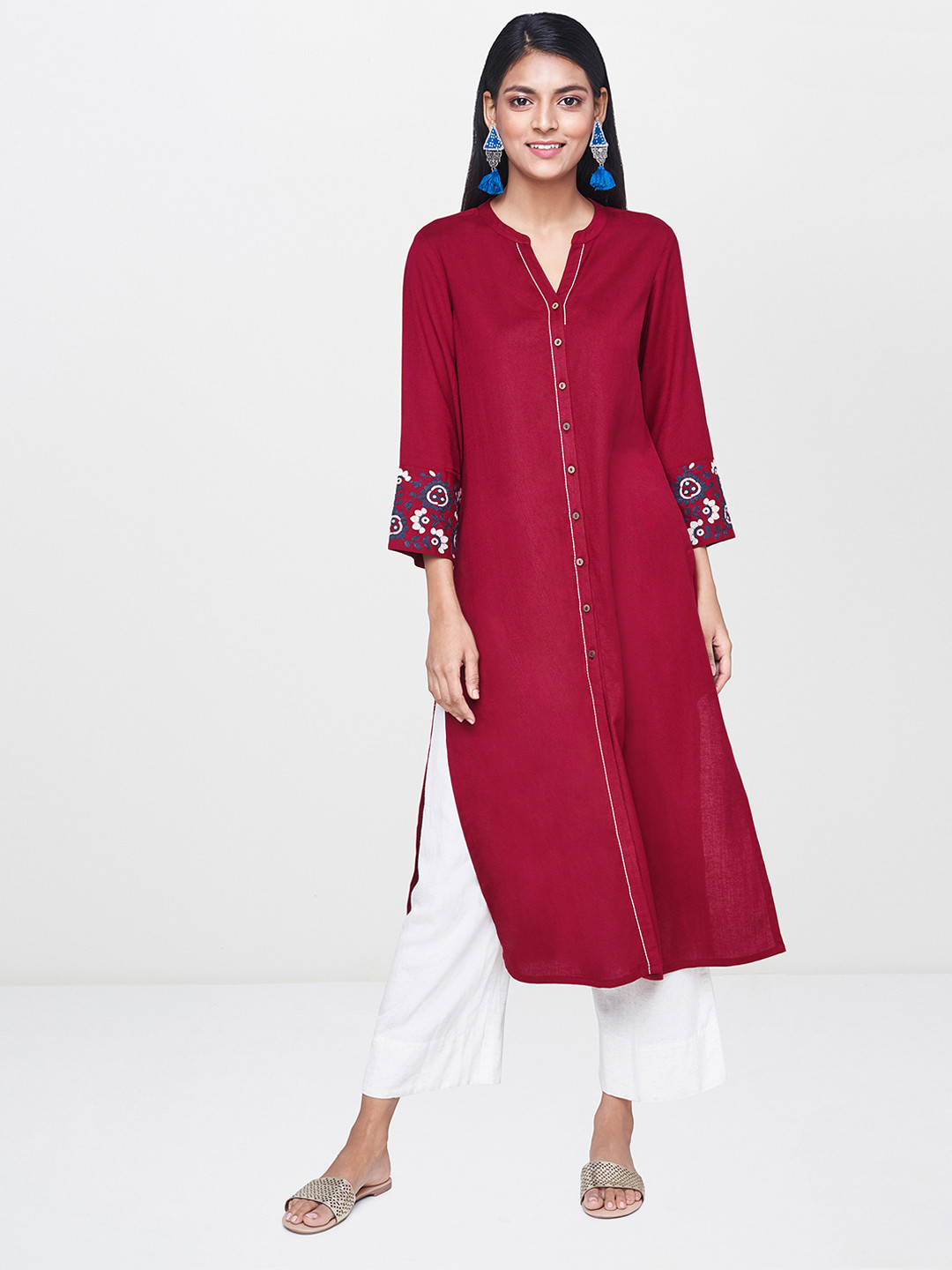 

Global Desi Women Maroon Solid Straight Kurta