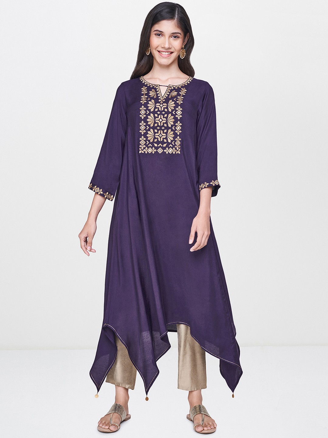 

Global Desi Women Purple Solid Asymmetric A-Line Kurta