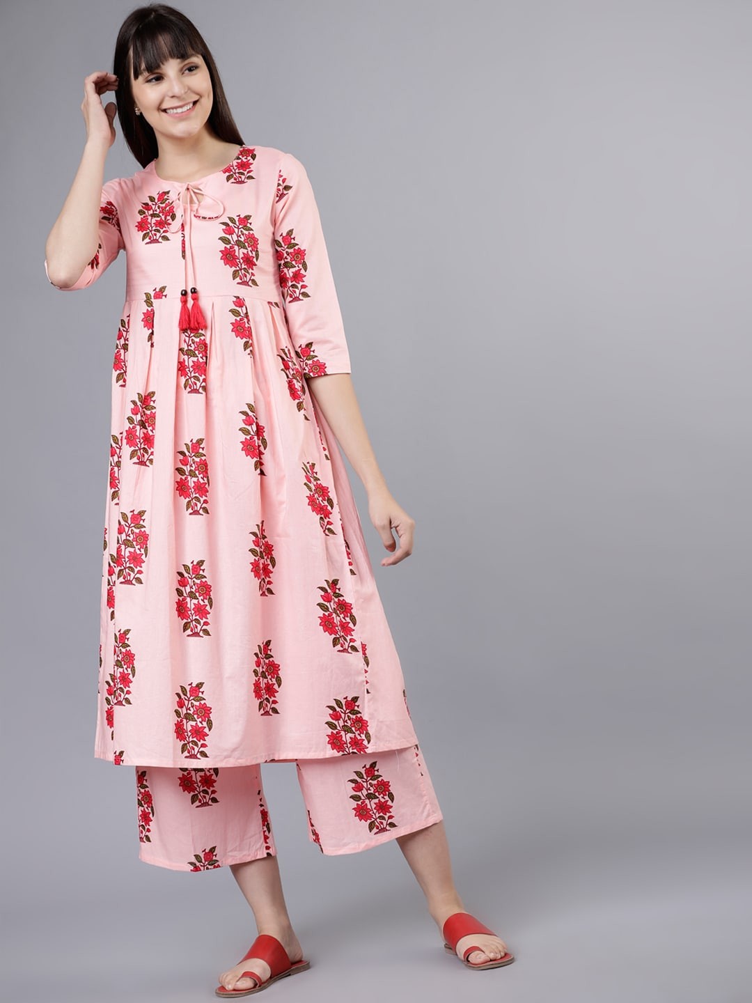

Vishudh Women Pink & Red Printed Kurta with Palazzos