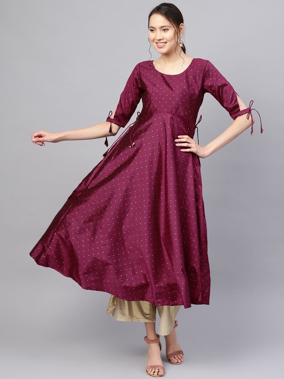 

Inddus Women Purple & Golden Woven Design A-Line Kurta