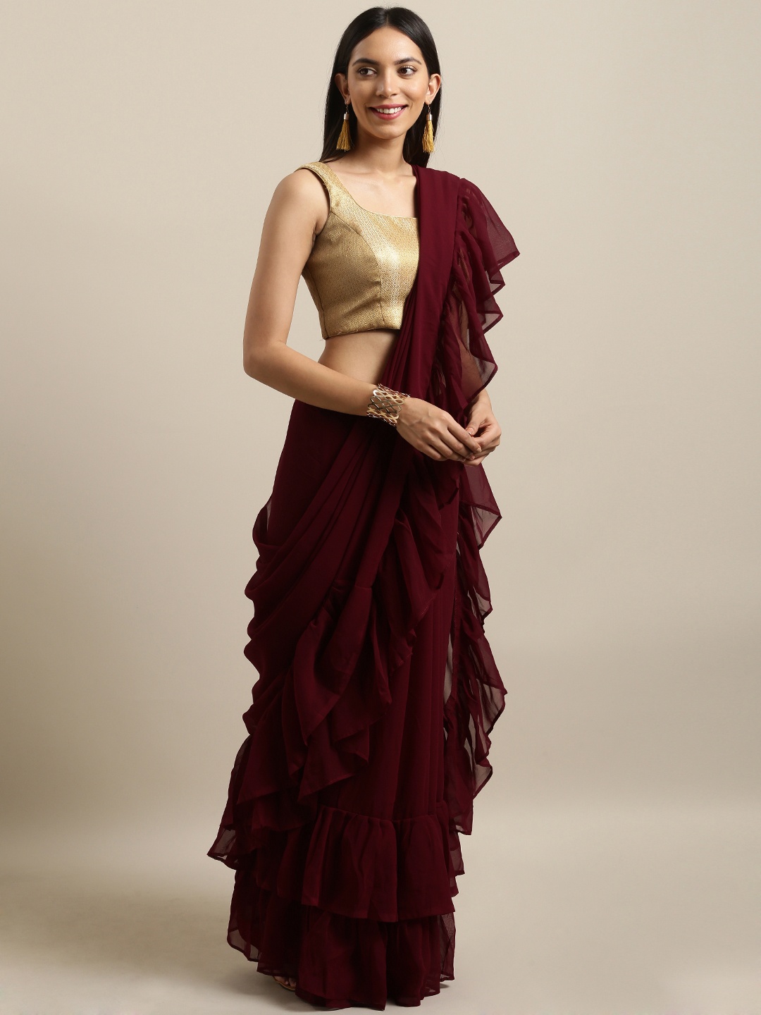 

Tikhi Imli Burgundy Solid Poly Georgette Ruffled Saree