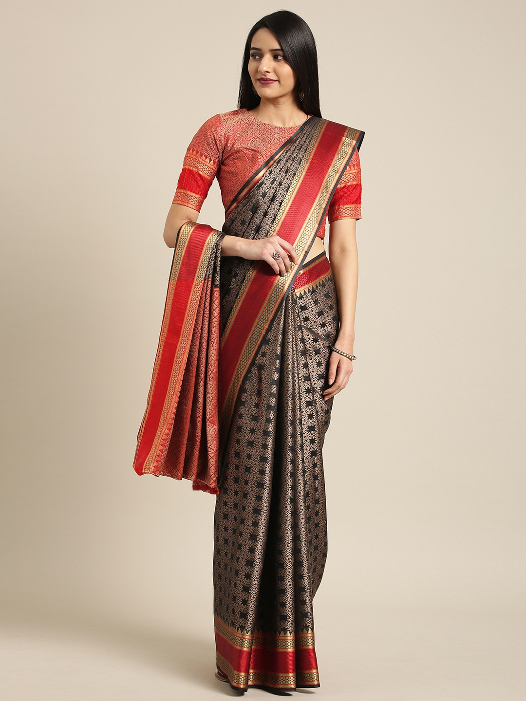 

Inddus Black & Gold Cotton Blend Woven Design Saree