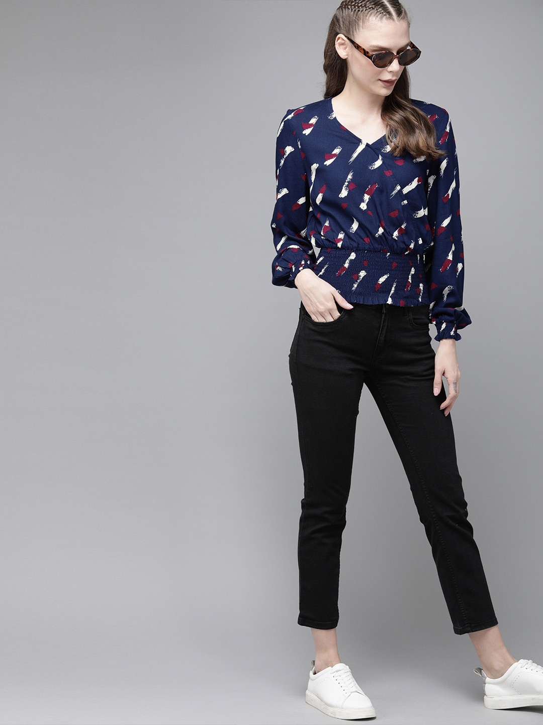 

The Roadster Lifestyle Co Women Navy Blue Printed Cinched Waist Top