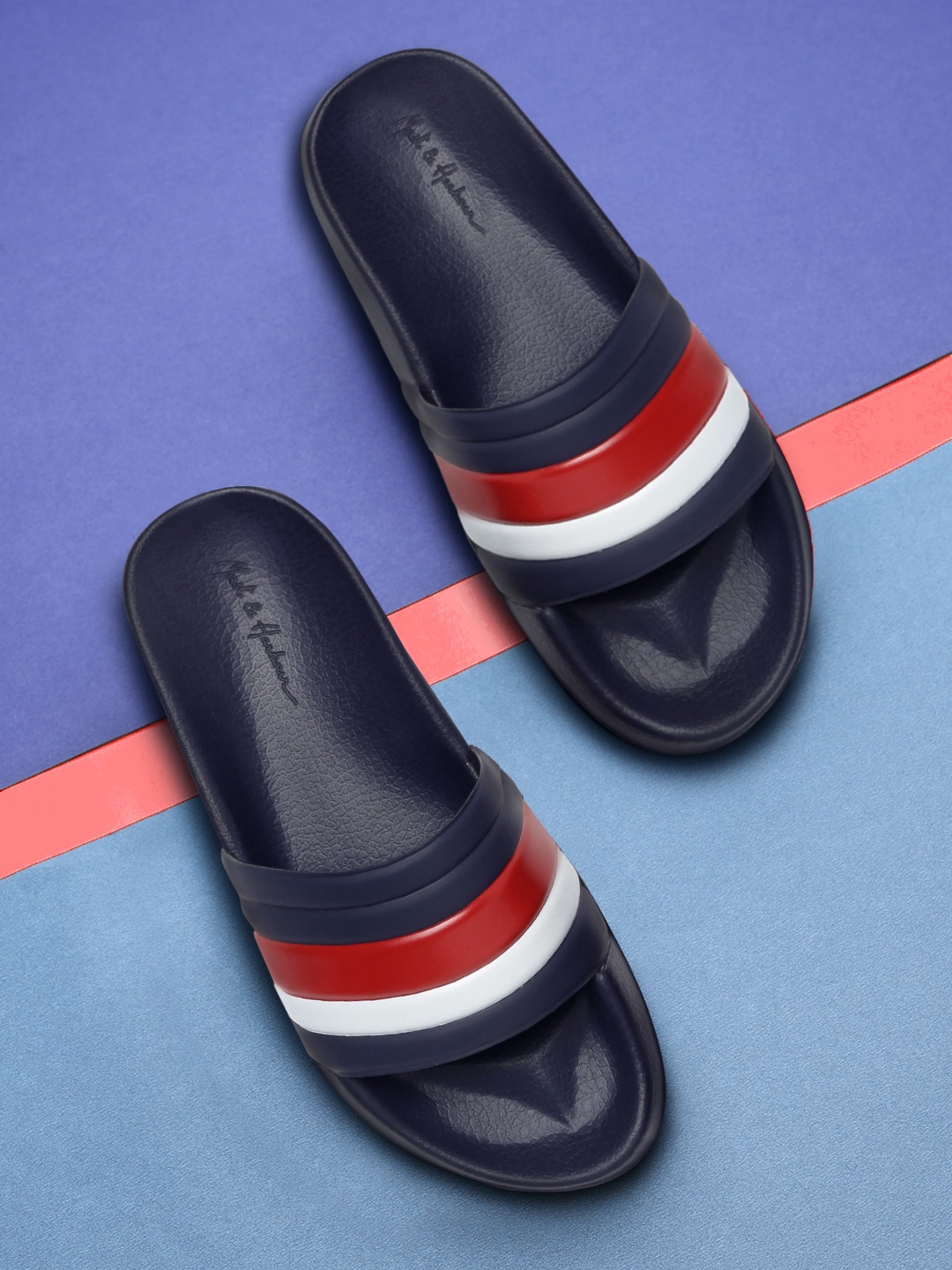 

Mast & Harbour Men Navy Blue & Red Colourblocked Sliders