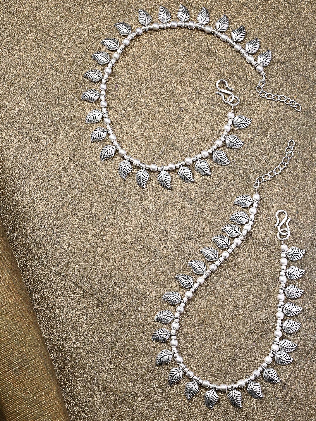 

Priyaasi Set of 2 Silver-Plated German Silver Oxidised Leaf Shaped Anklets