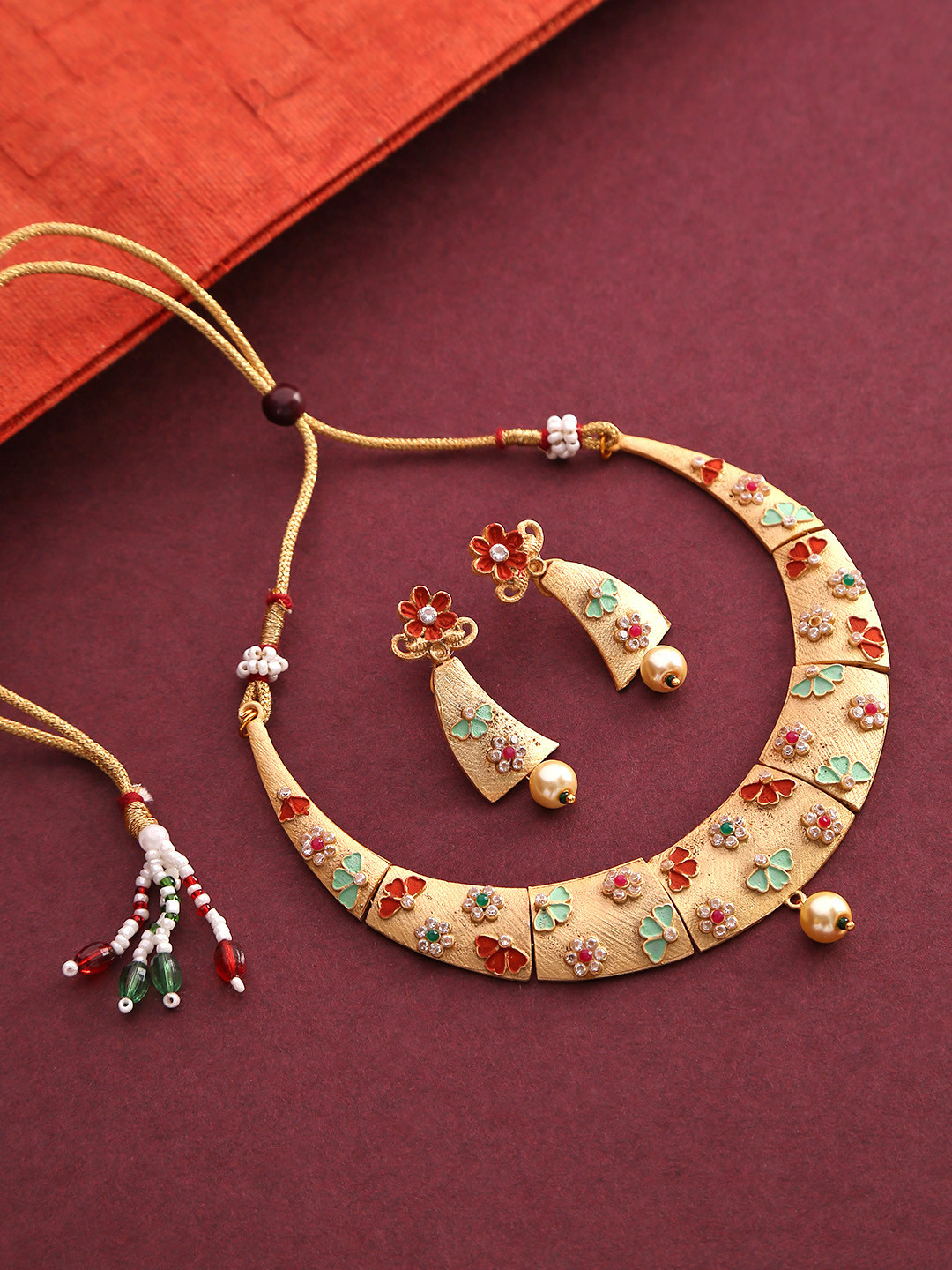 

Priyaasi Green Gold-Plated Matte-Finish Stone-Studded Beaded Hand-Painted Jewellery Set
