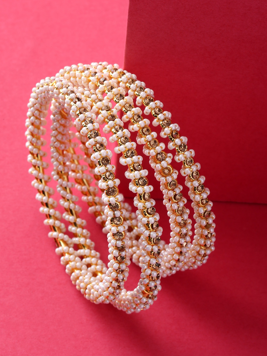 

Priyaasi Set of 4 Off White Gold-Plated Stone-Studded Beaded Handcrafted Bangles