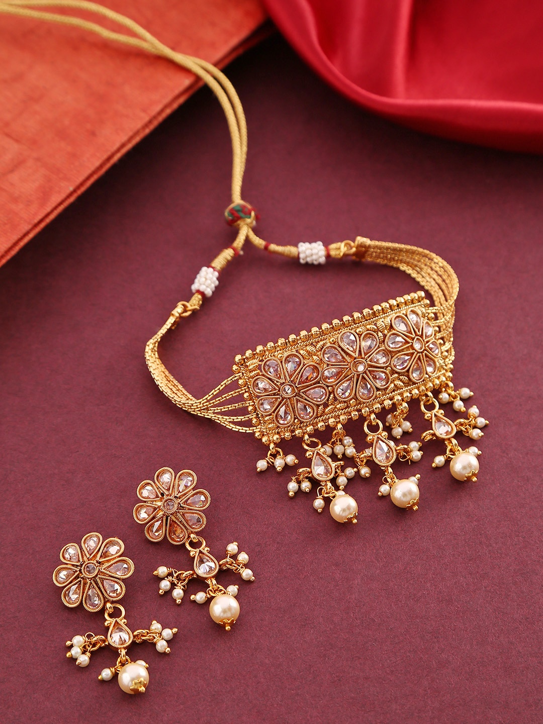 

Priyaasi Gold-Plated Stone-Studded Beaded Handcrafted Jewellery Set