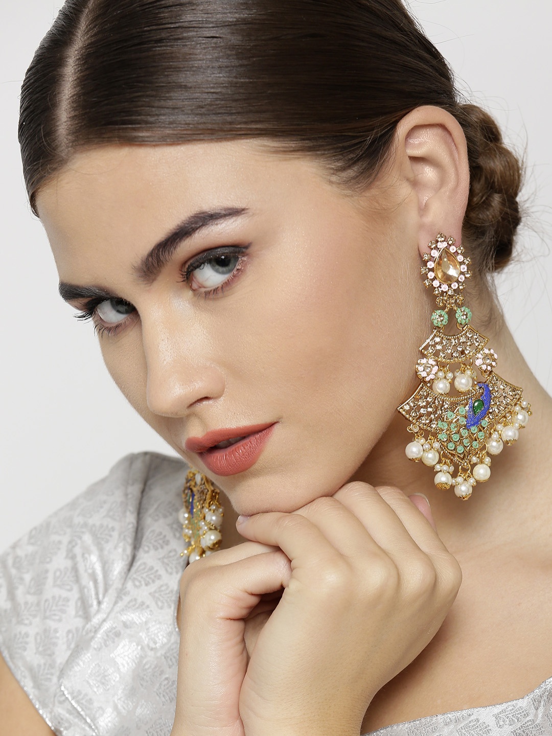 

Priyaasi Green & Pink Gold-Plated Stone-Studded Handcrafted Peacock Shaped Drop Earrings