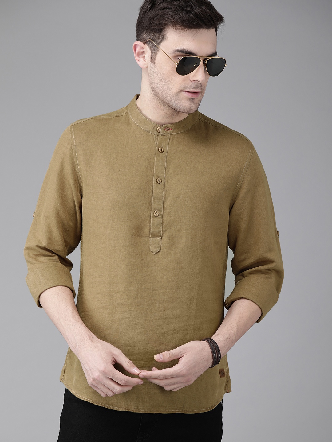 

The Roadster Lifestyle Co Men Khaki Regular Fit Solid Casual Shirt