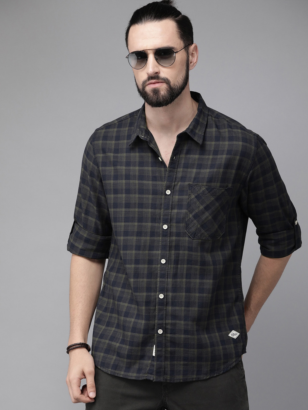 

The Roadster Lifestyle Co Men Olive Green & Navy Blue Checked Casual Shirt
