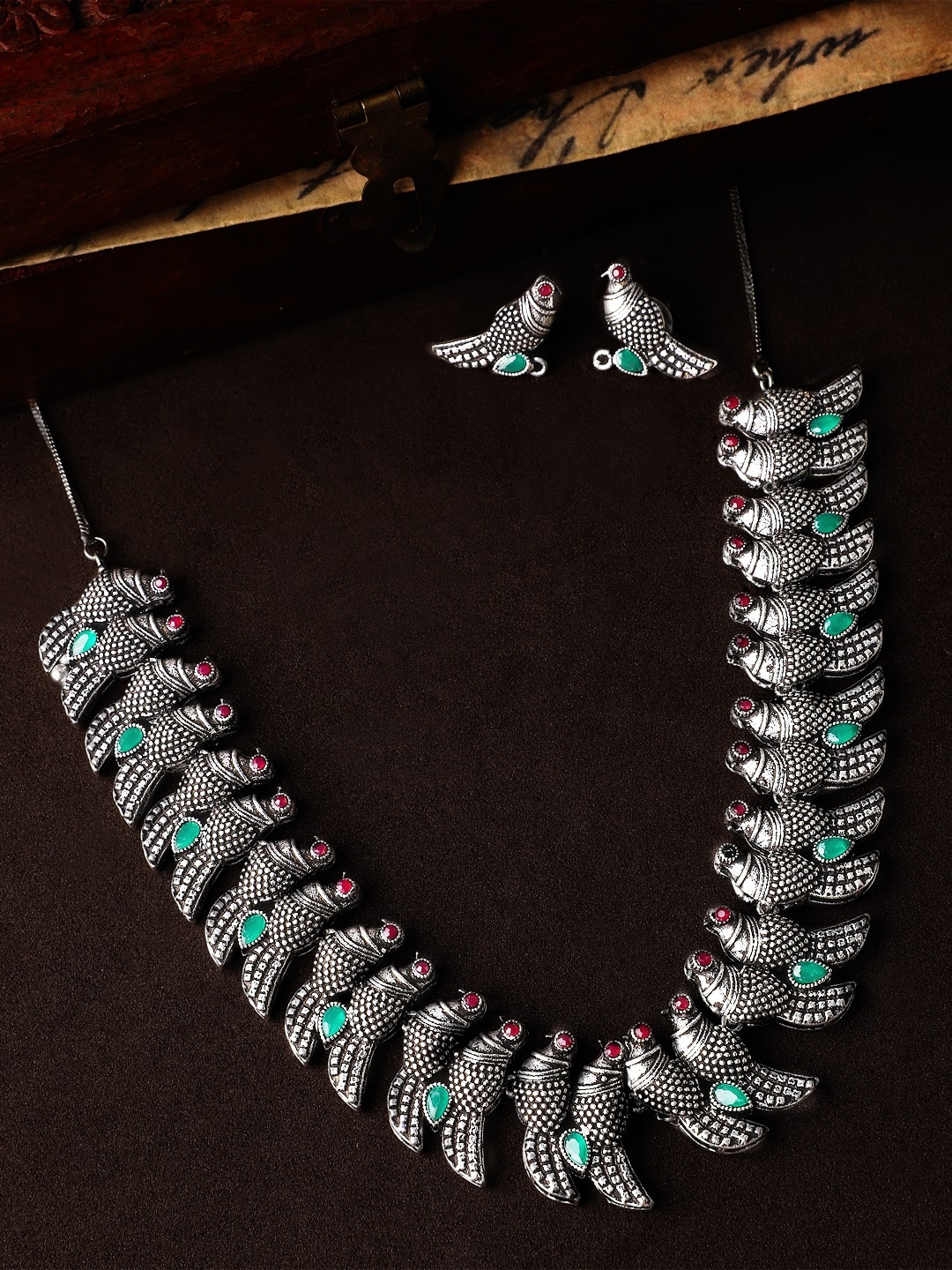 

Rubans Women Oxidised Silver-Toned Hand Crafted Parrot Shaped Jewellery Set