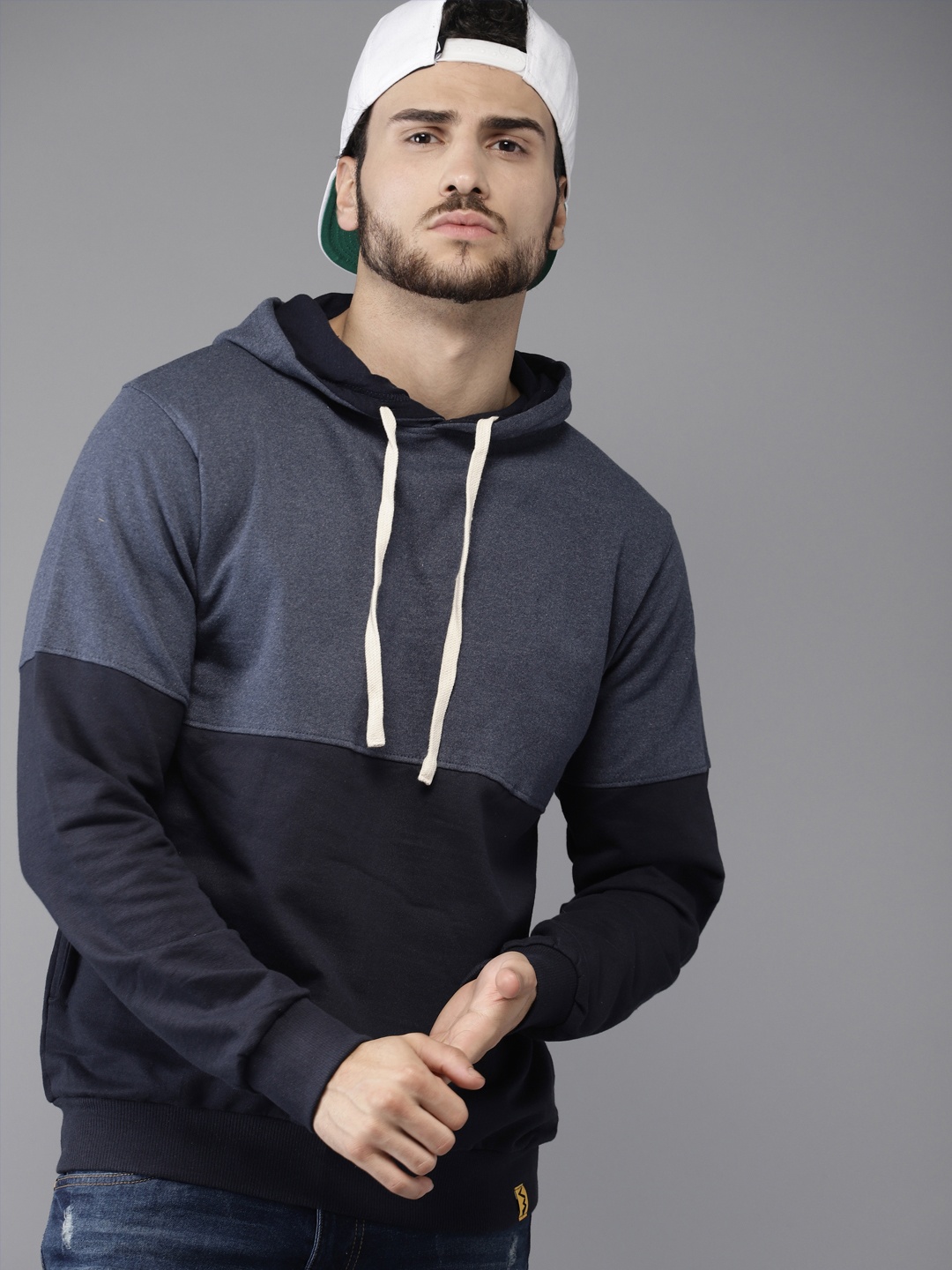 

Campus Sutra Men Navy Blue Colourblocked Hooded Sweatshirt