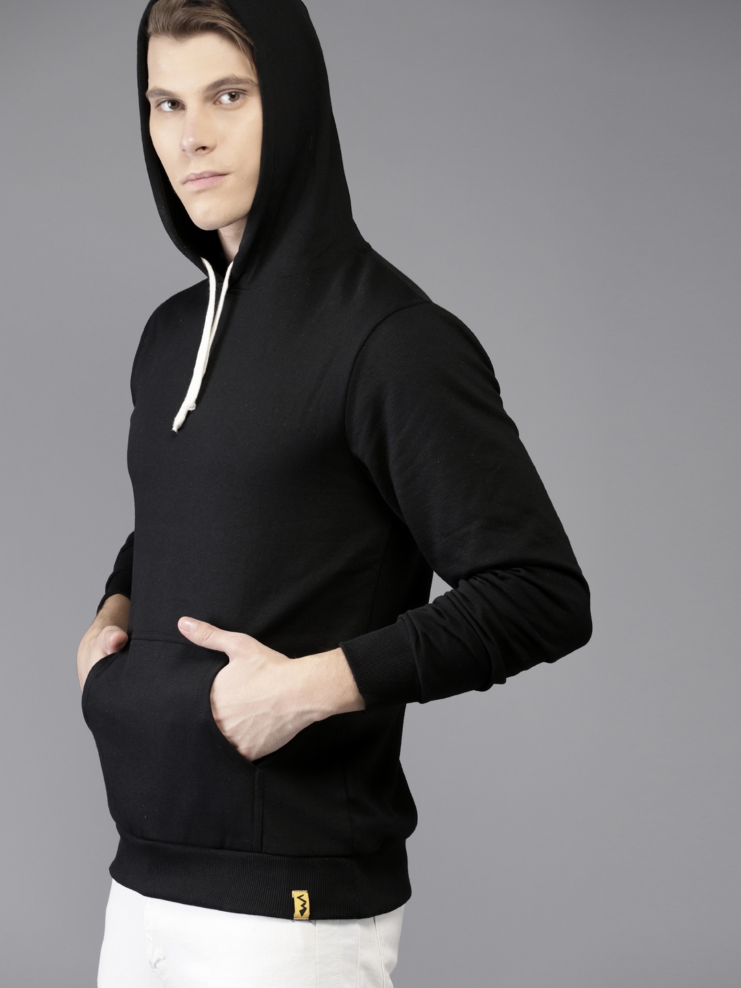

Campus Sutra Men Black Solid Hooded Sweatshirt