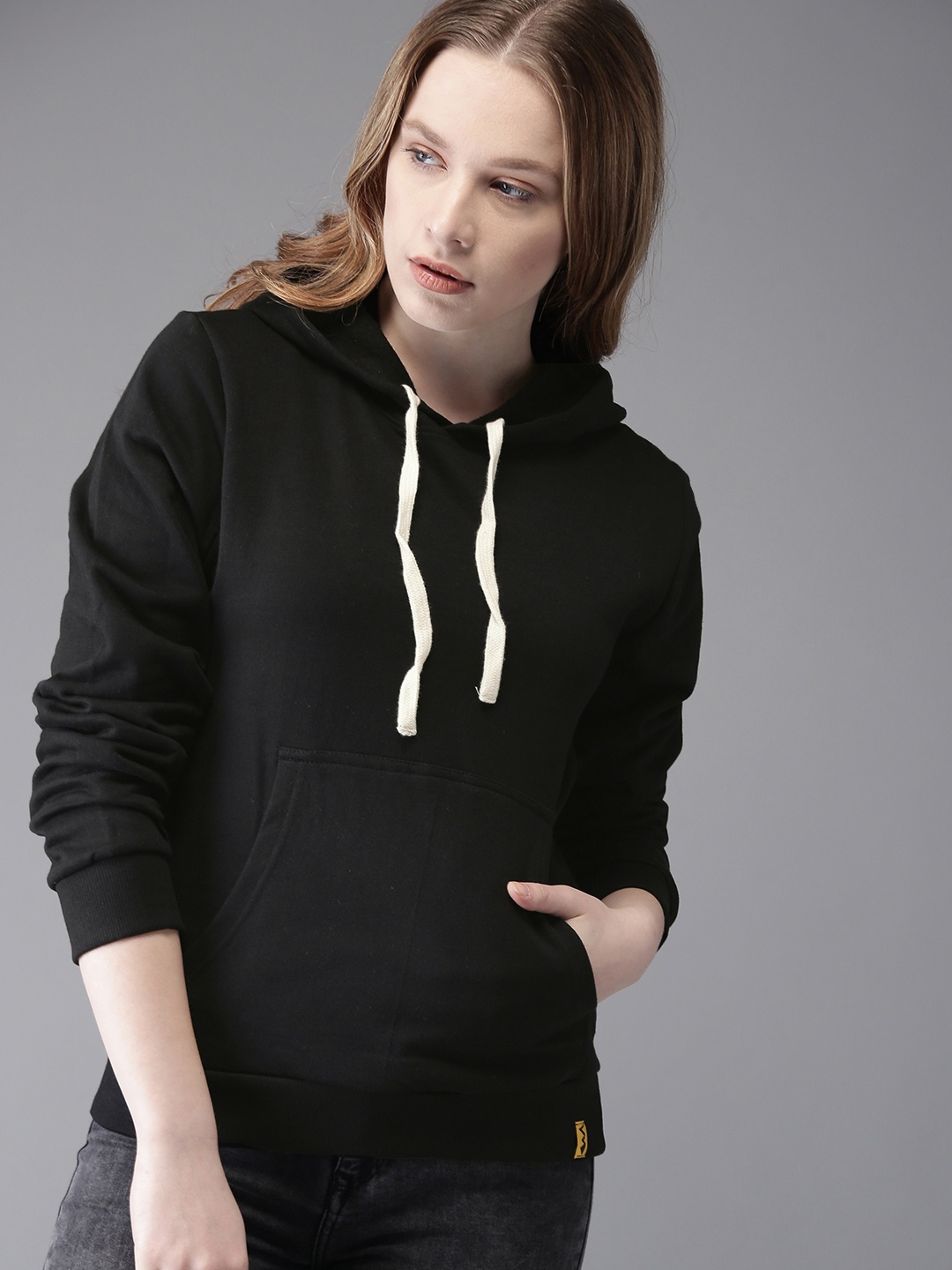 

Campus Sutra Women Black Solid Hooded Sweatshirt