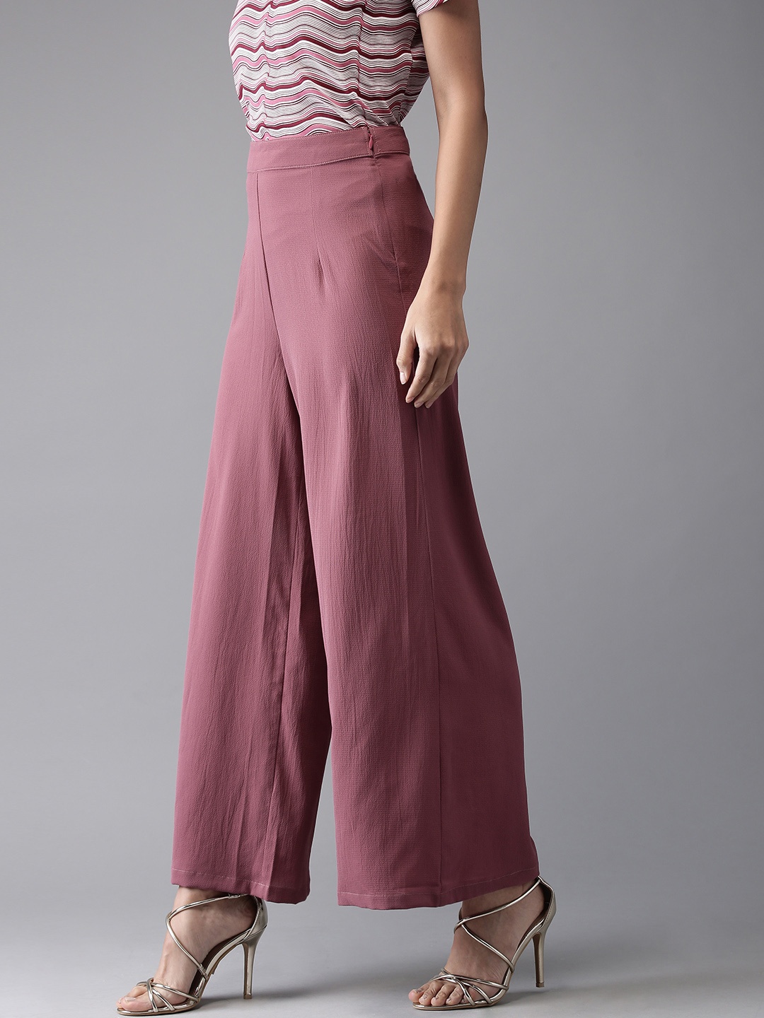 

Moda Rapido Women Mauve Regular Fit Solid Parallel Trousers