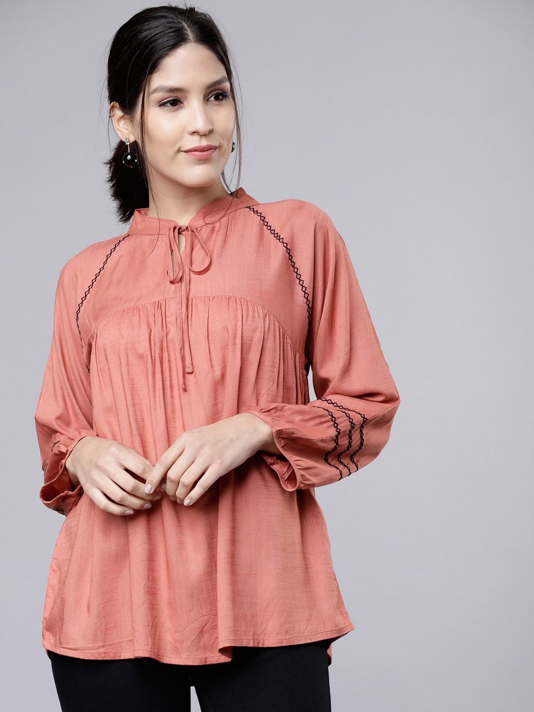 

Tokyo Talkies Women Peach-Coloured Solid Top