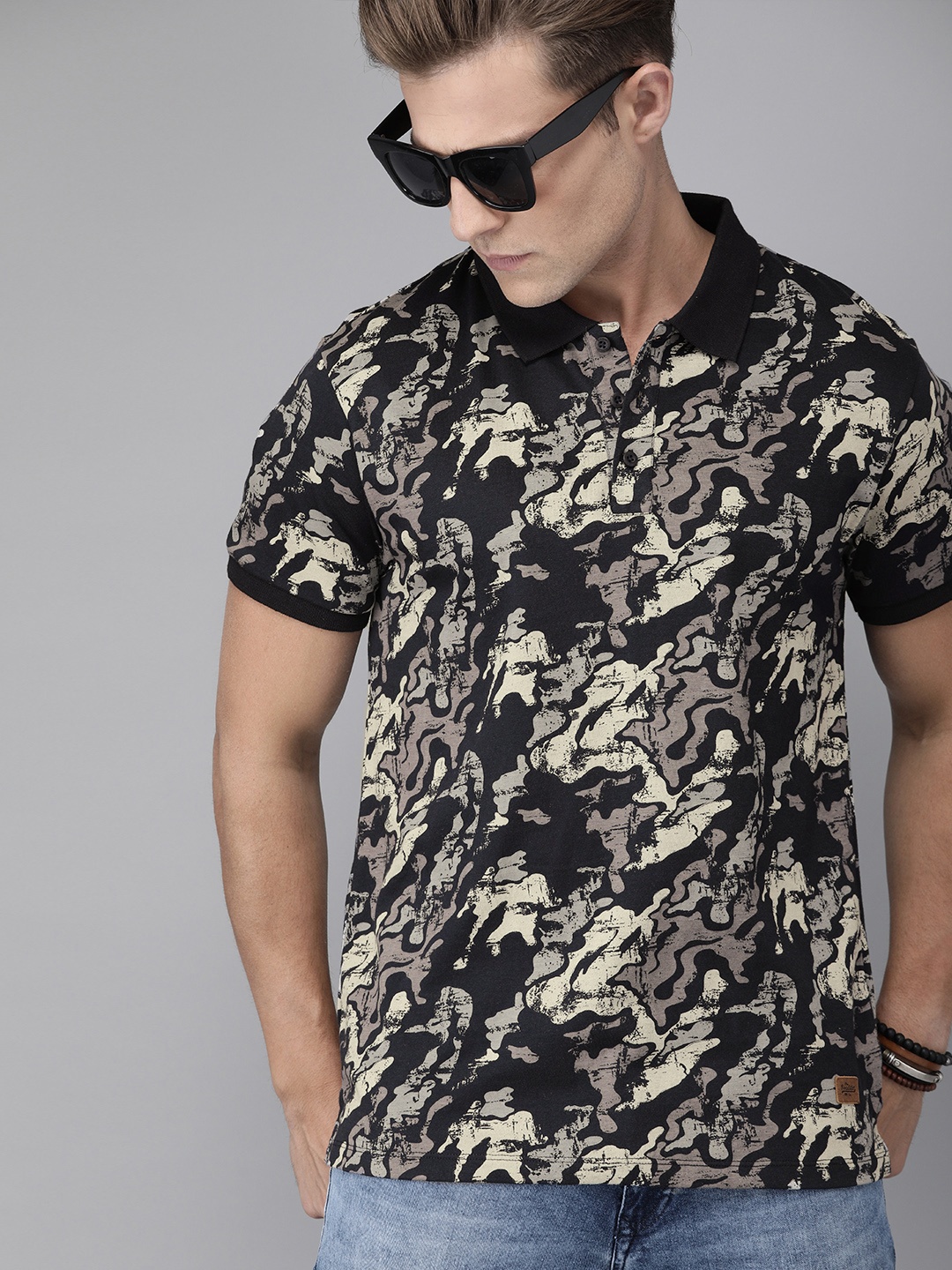

The Roadster Lifestyle Co Men Navy Blue Printed Polo Collar T-shirt
