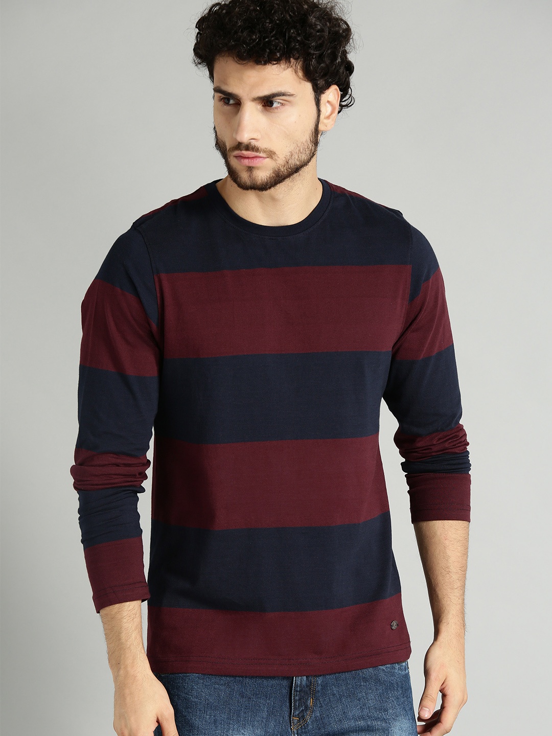 

Roadster Men Navy Blue & Maroon Striped Round Neck T-shirt