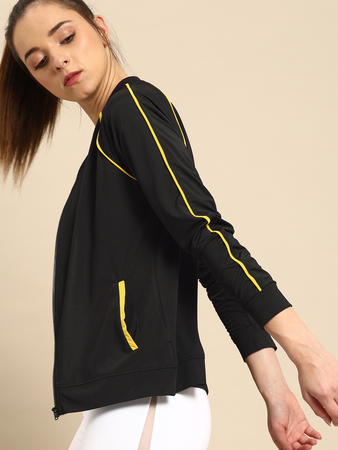 

DressBerry Women Black Solid Sporty Jacket