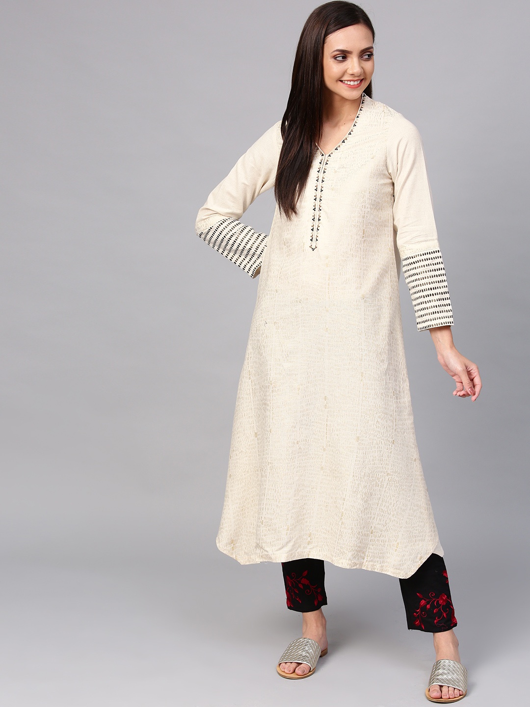 

Biba Women Off-White & Golden Printed Asymmetric A-Line Kurta