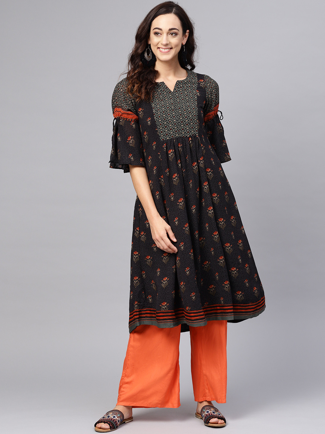 

Biba Women Black & Green Floral Printed A-Line Kurta