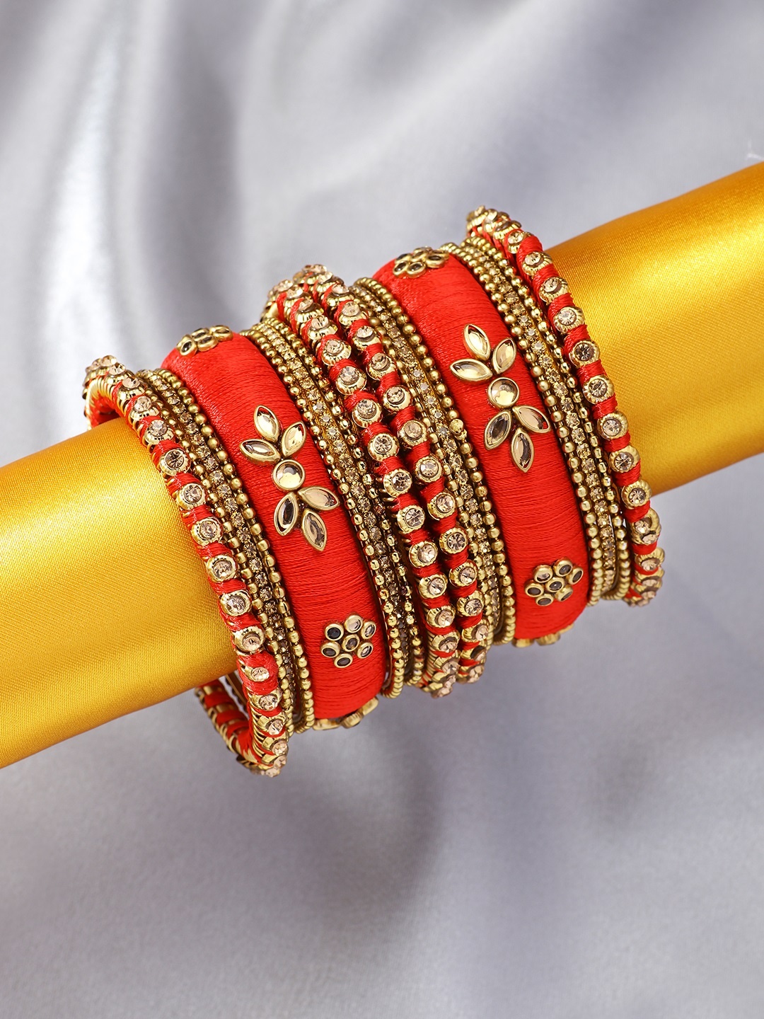 

Peora Set of 18 Gold-Plated & Red Embellished Handmade Silk Thread Chudas