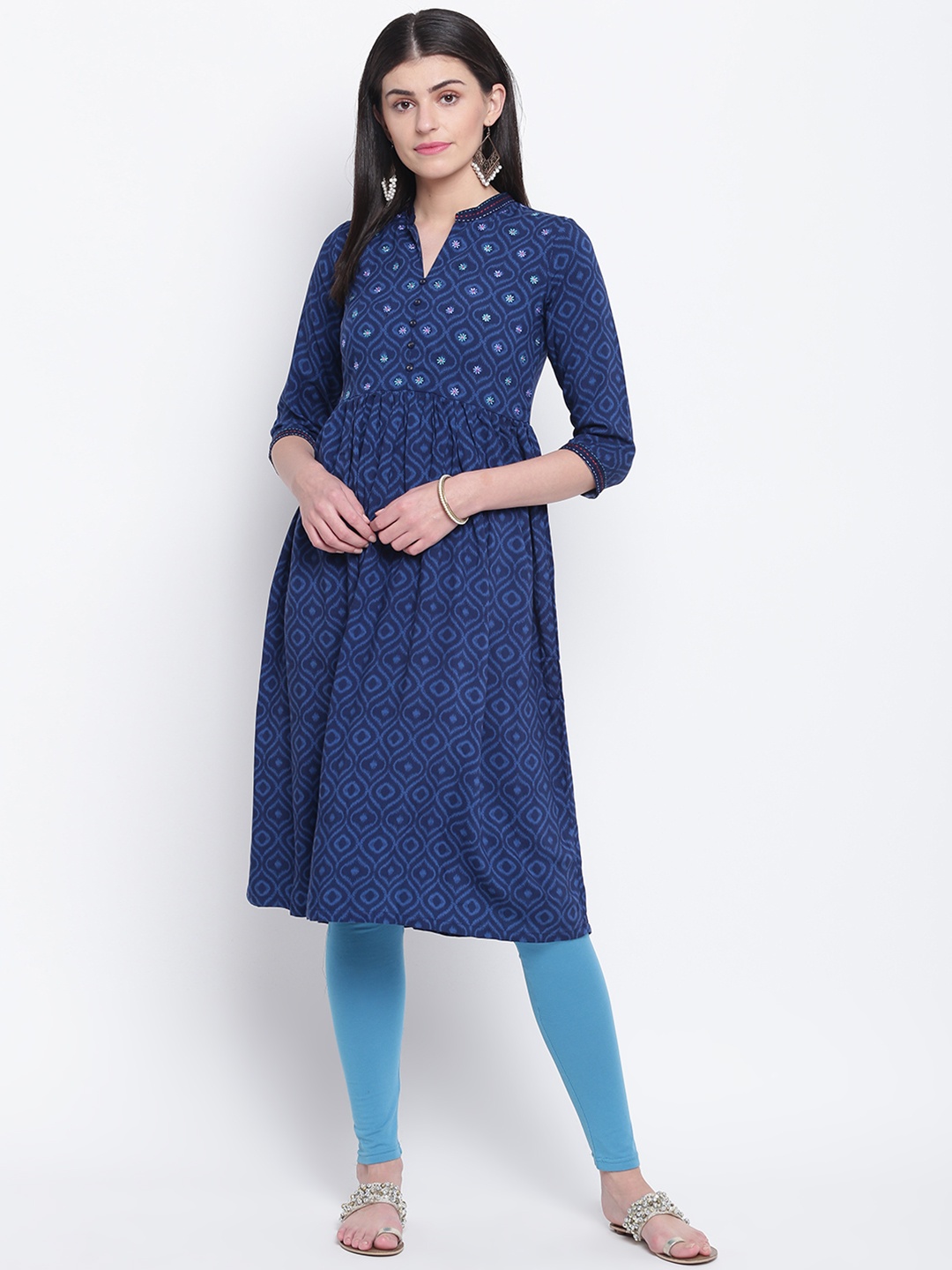 

Rangriti Women Navy Blue Ethnic Print A-Line Kurta with Embroidered Detail