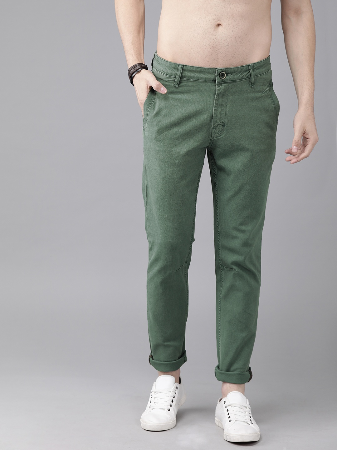 

The Roadster Lifestyle Co Men Green Regular Fit Solid Regular Trousers