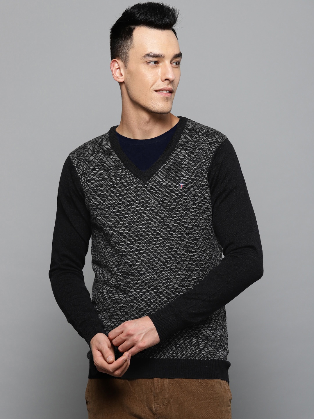 

Louis Philippe Sport Men Black & Off-White Self Design Sweater