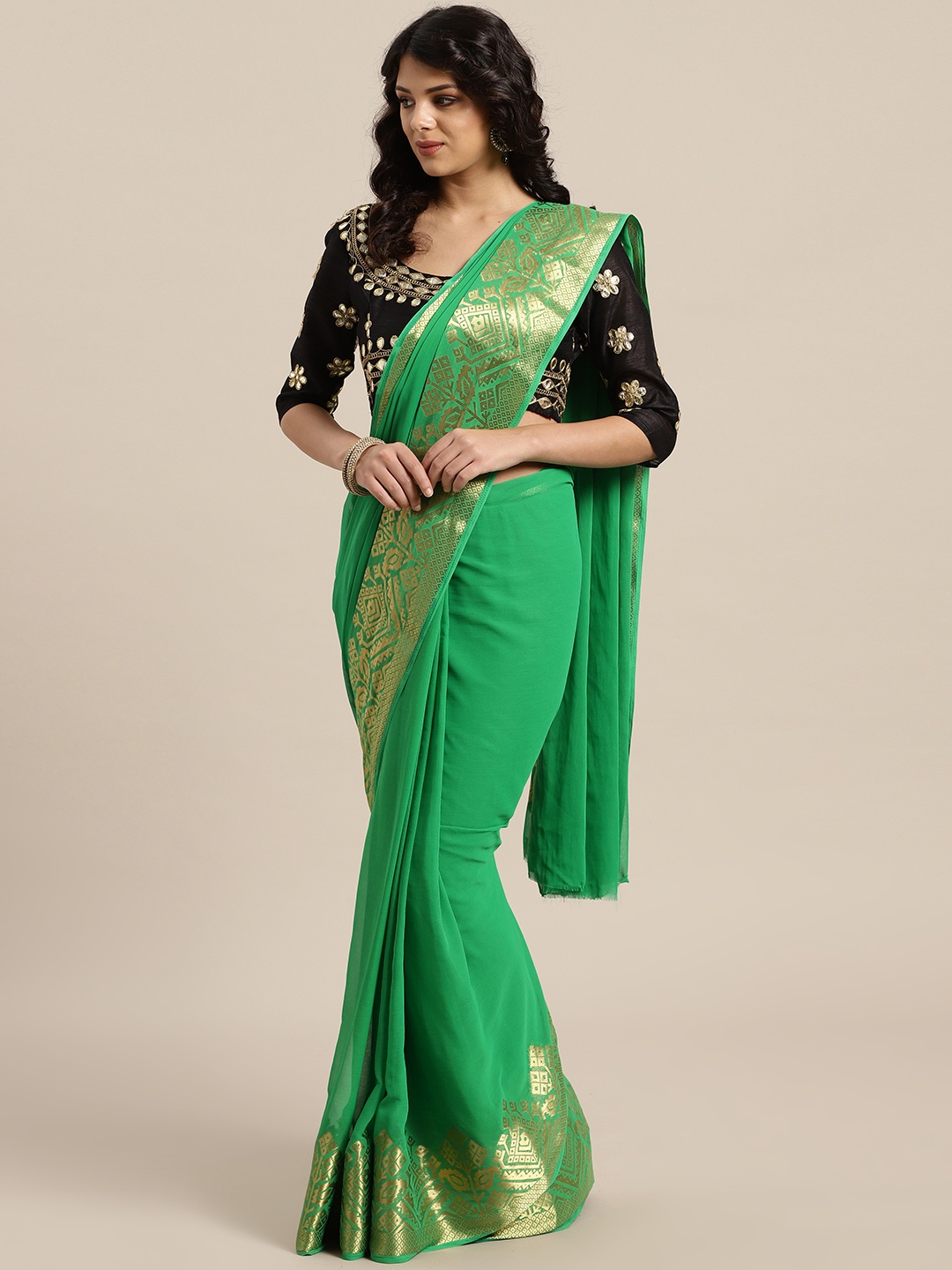 

Saree mall Green Solid Saree