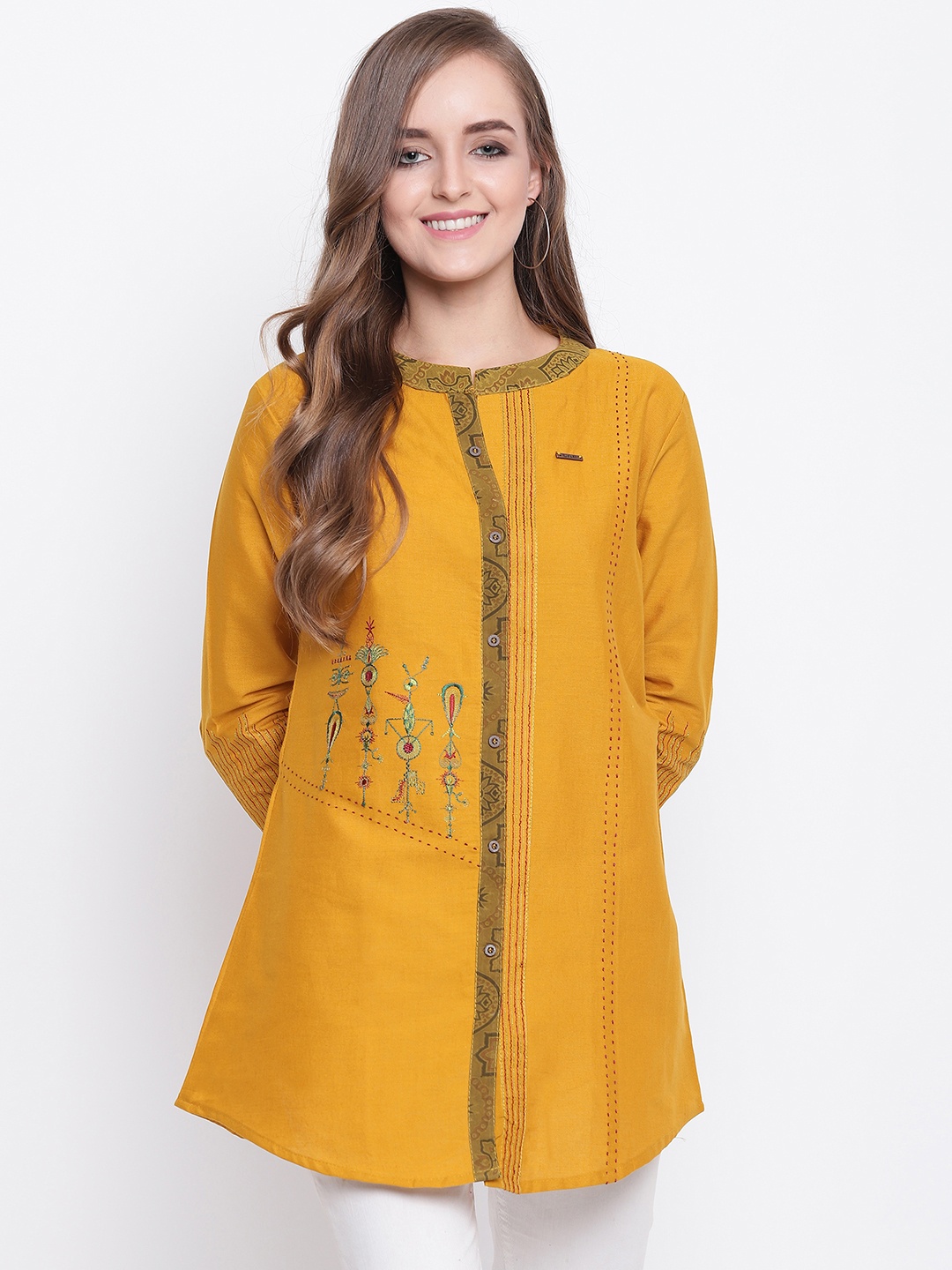 

Kvsfab Women Mustard Yellow Embroidered A-Line Kurti