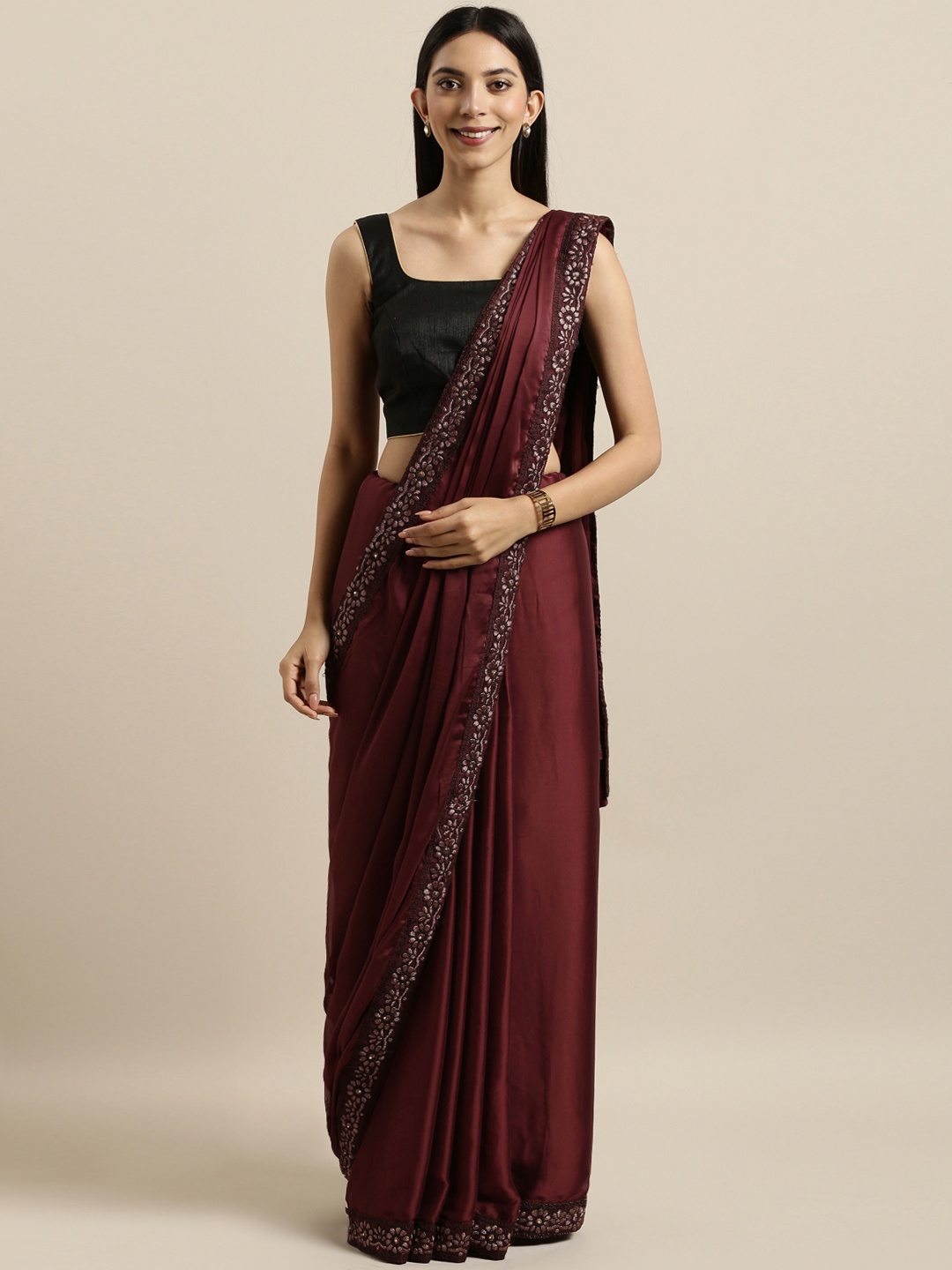 

Kalista Brown Solid Poly Georgette Saree