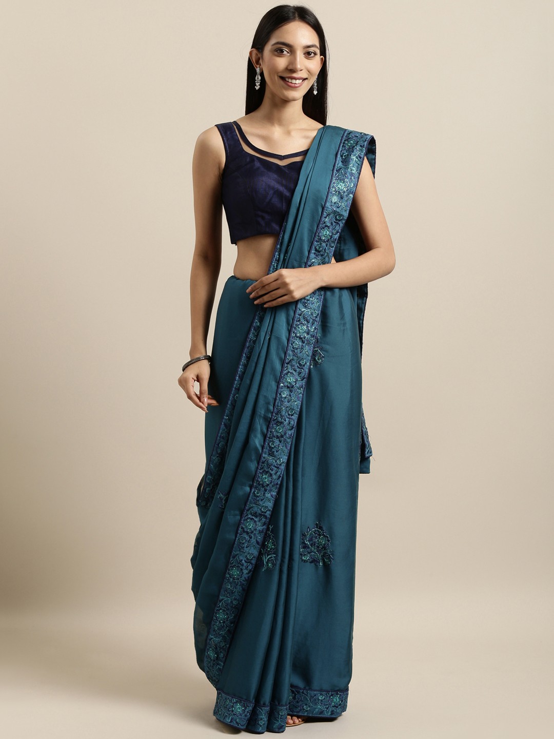 

Kalista Teal Blue Embroidered Poly Georgette Saree