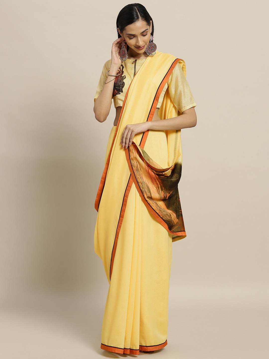 

Shaily Yellow Solid Pure Georgette Saree