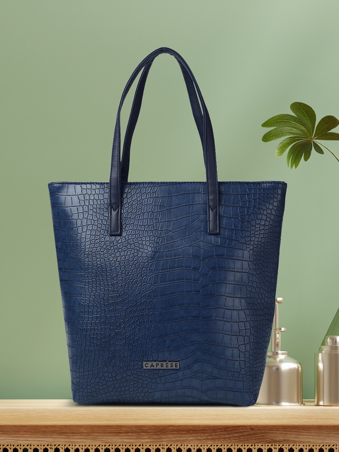 

Caprese Blue Textured Shoulder Bag