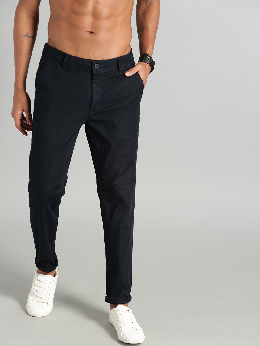 

The Roadster Lifestyle Co Men Navy Blue Self-Design Trousers