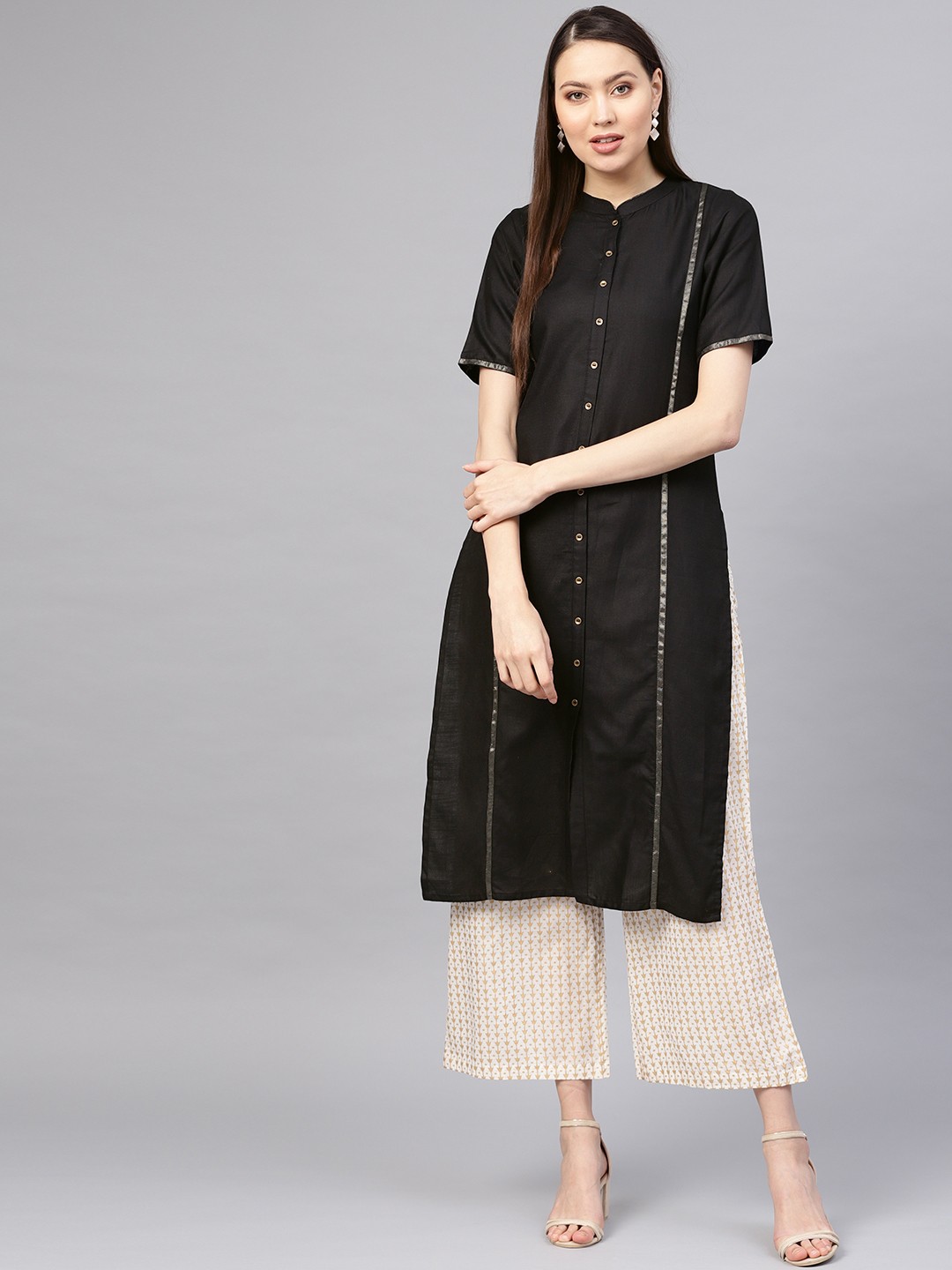 

Indo Era Women Black Solid Straight Kurta