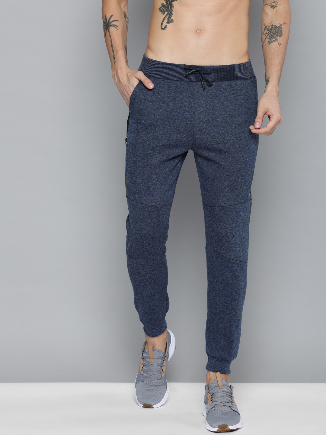 

HRX by Hrithik Roshan Active Men Navy Blue Solid Slim Fit Rapid Dry Training Joggers