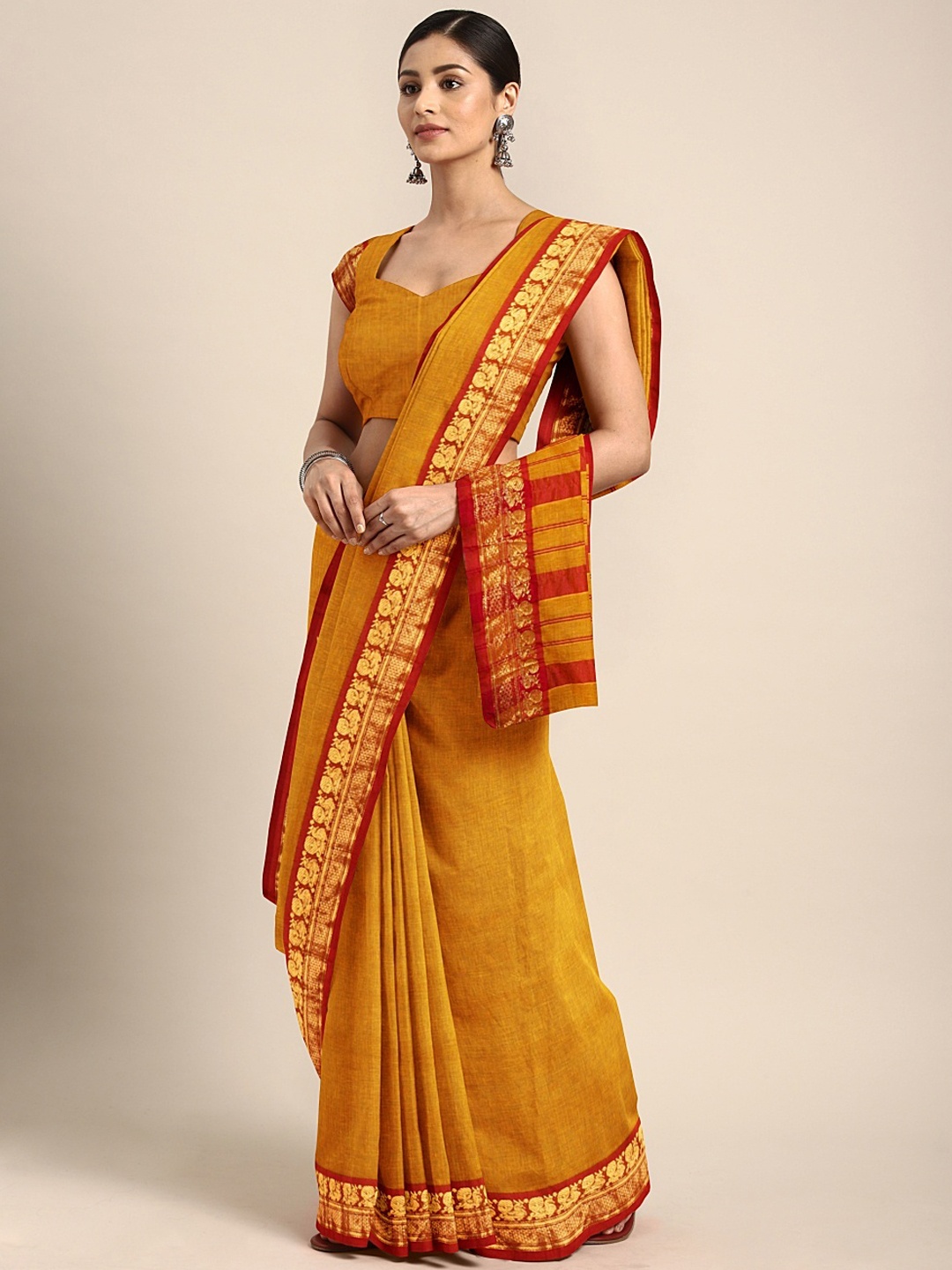 

Pavechas Mustard Yellow Pure Cotton Solid Venkatgiri Saree