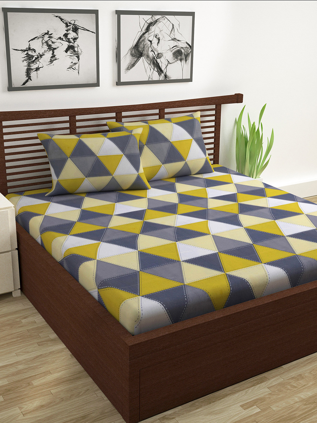 

Divine Casa Blue & Yellow Geometric 120 TC Double Bedsheet with 2 Pillow Covers
