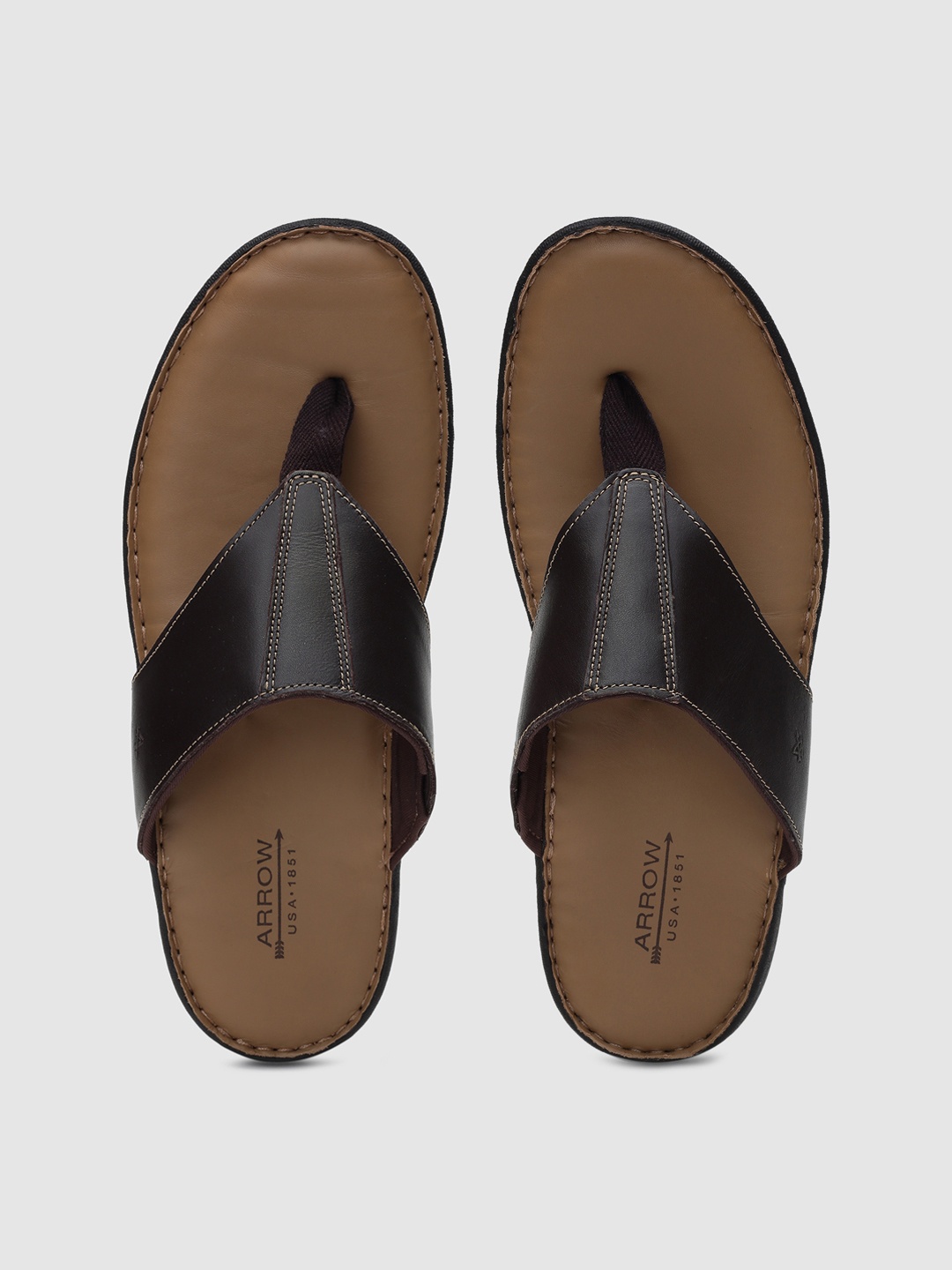 

Arrow Men Brown Solid Thong Flip-Flops