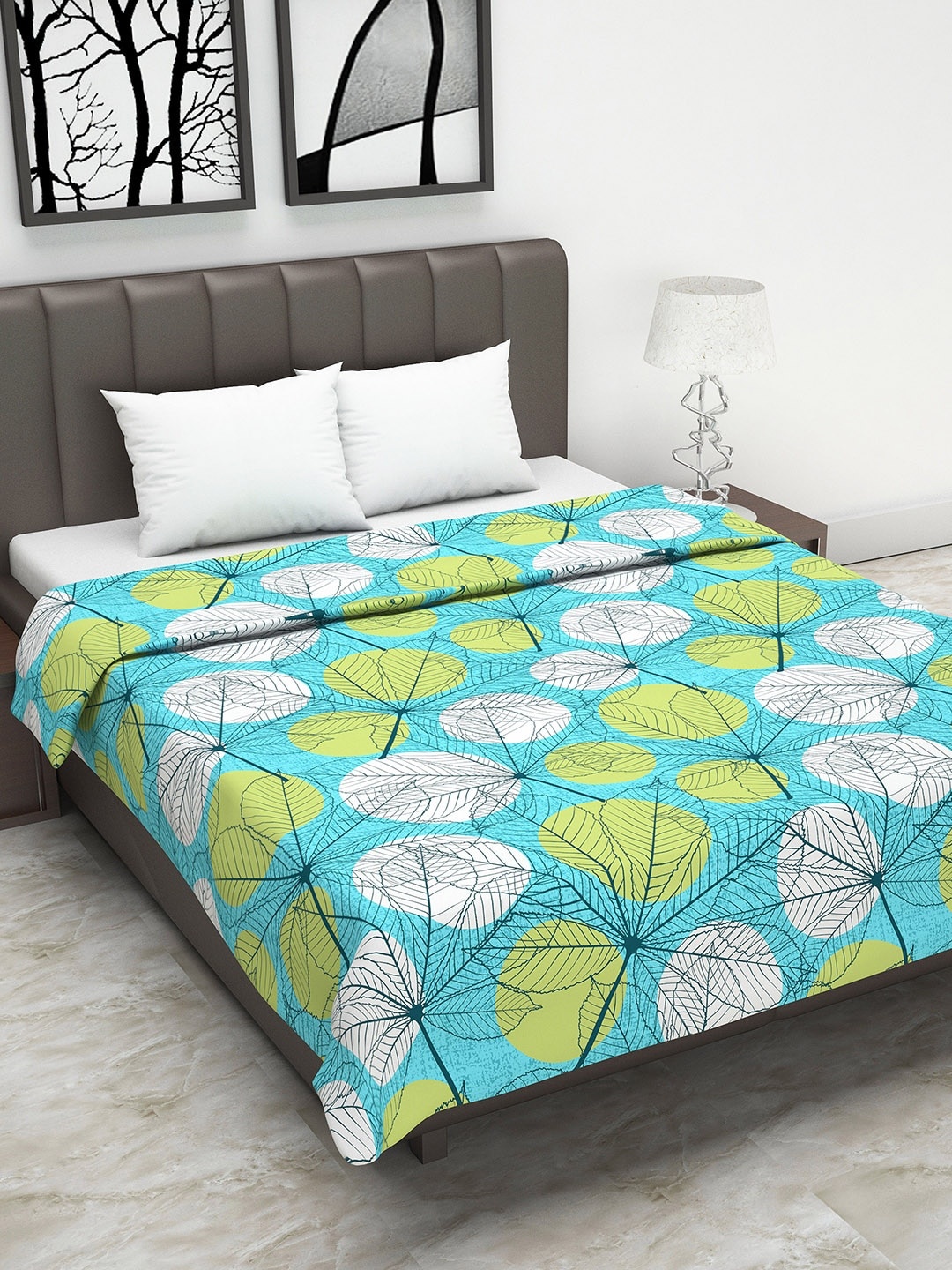 

Divine Casa Turquoise Blue & Green Floral AC Room 110 GSM Double Bed Dohar
