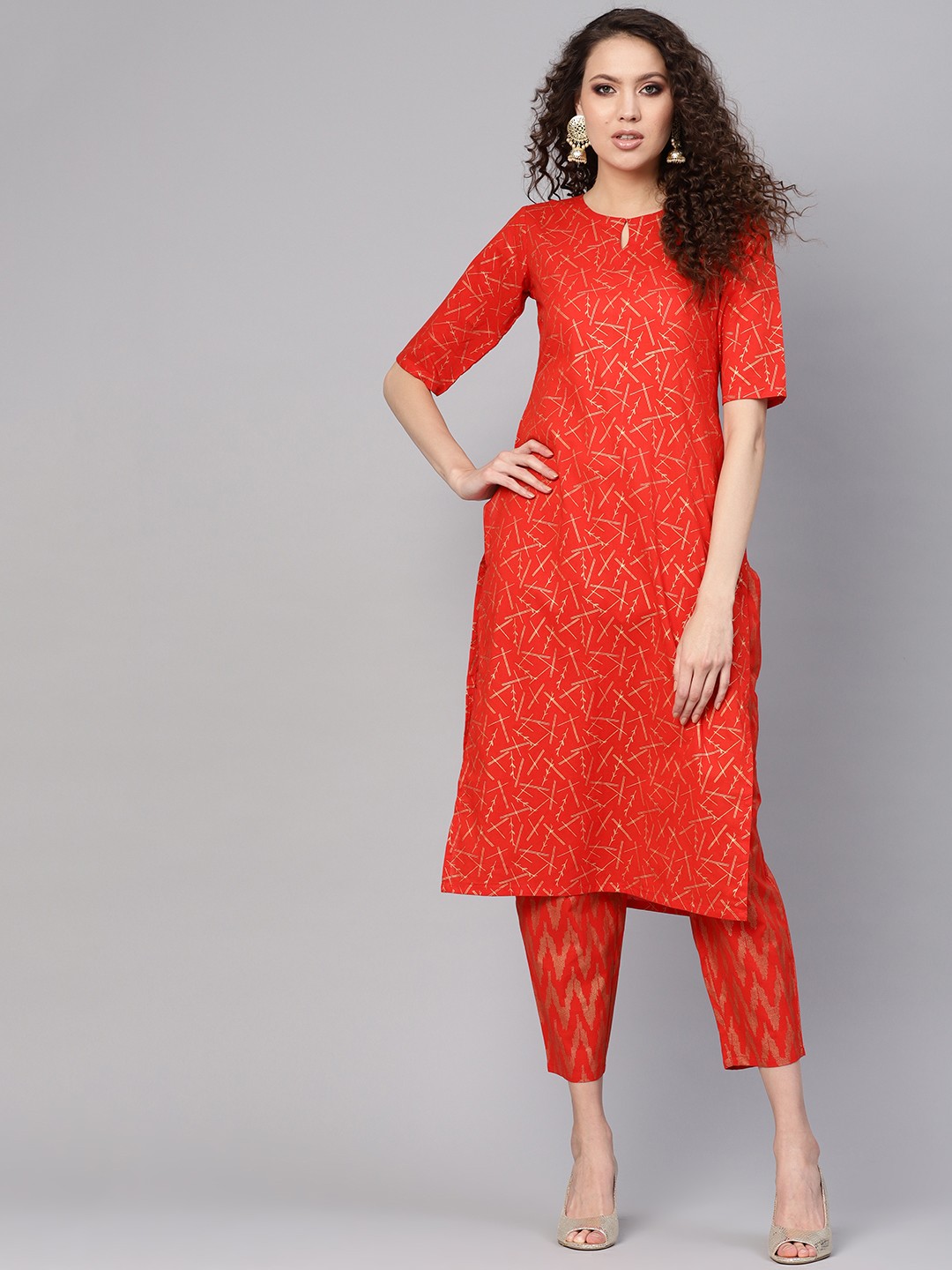 

Gerua By Libas Women Red Golden Block Print Kurta with Trousers