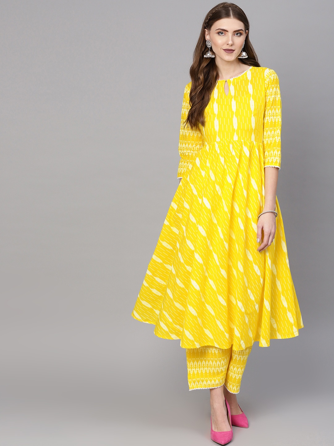 

Gerua By Libas Women Yellow White Ikat Print Kurta with Palazzos