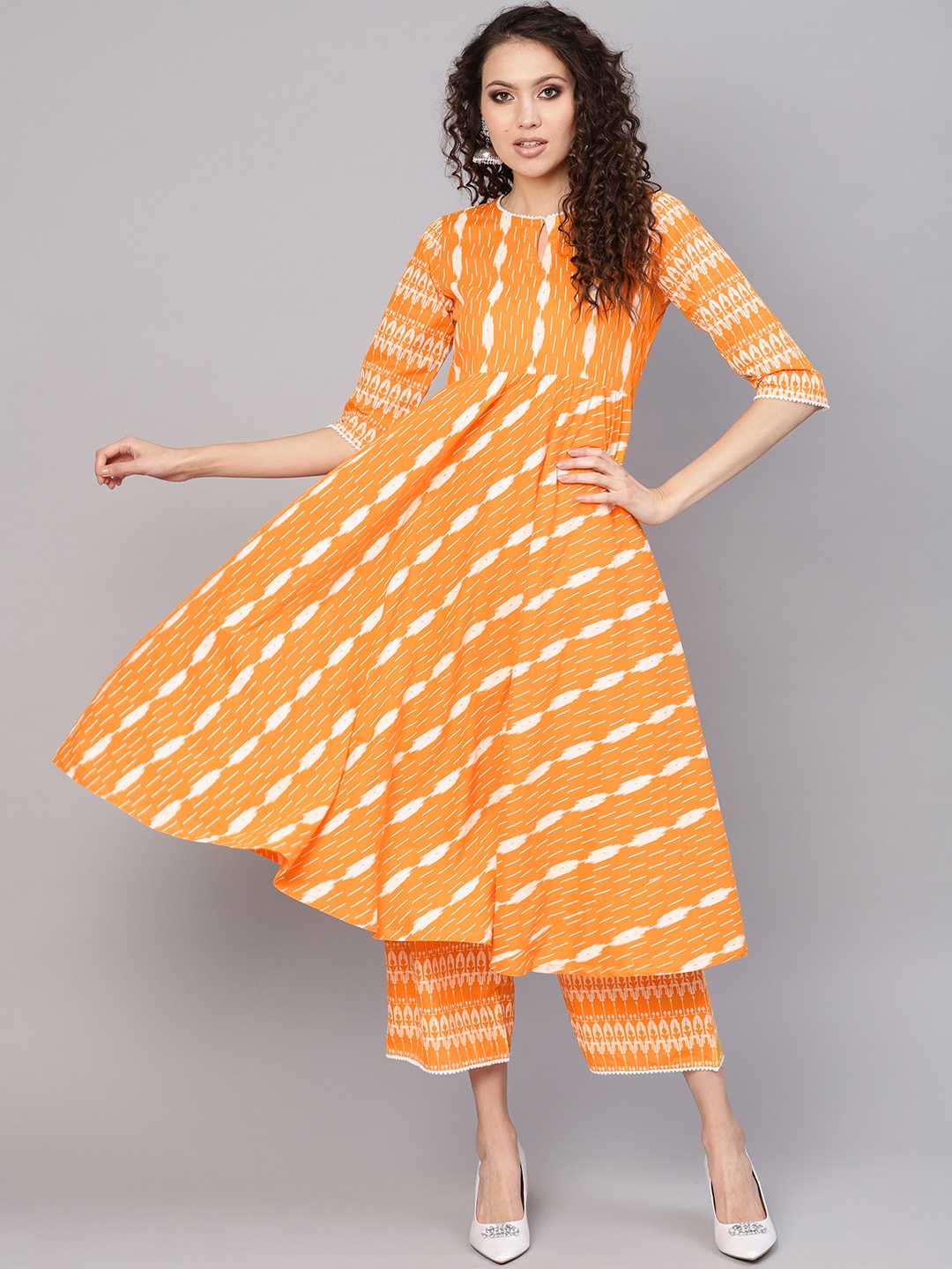 

Gerua By Libas Women Orange White Printed Kurta with Palazzos