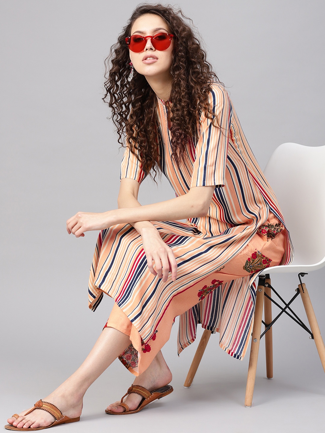 

Gerua By Libas Women Peach-Coloured Blue Striped Kurta with Palazzos