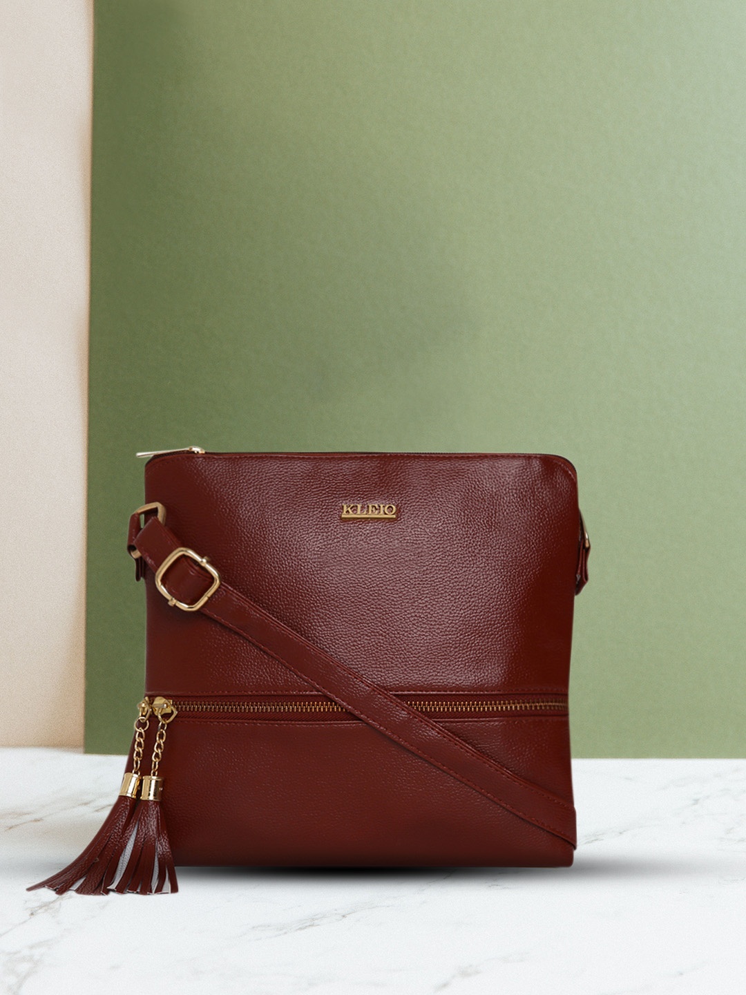 

KLEIO Brown Solid Sling Bag with Tasseled
