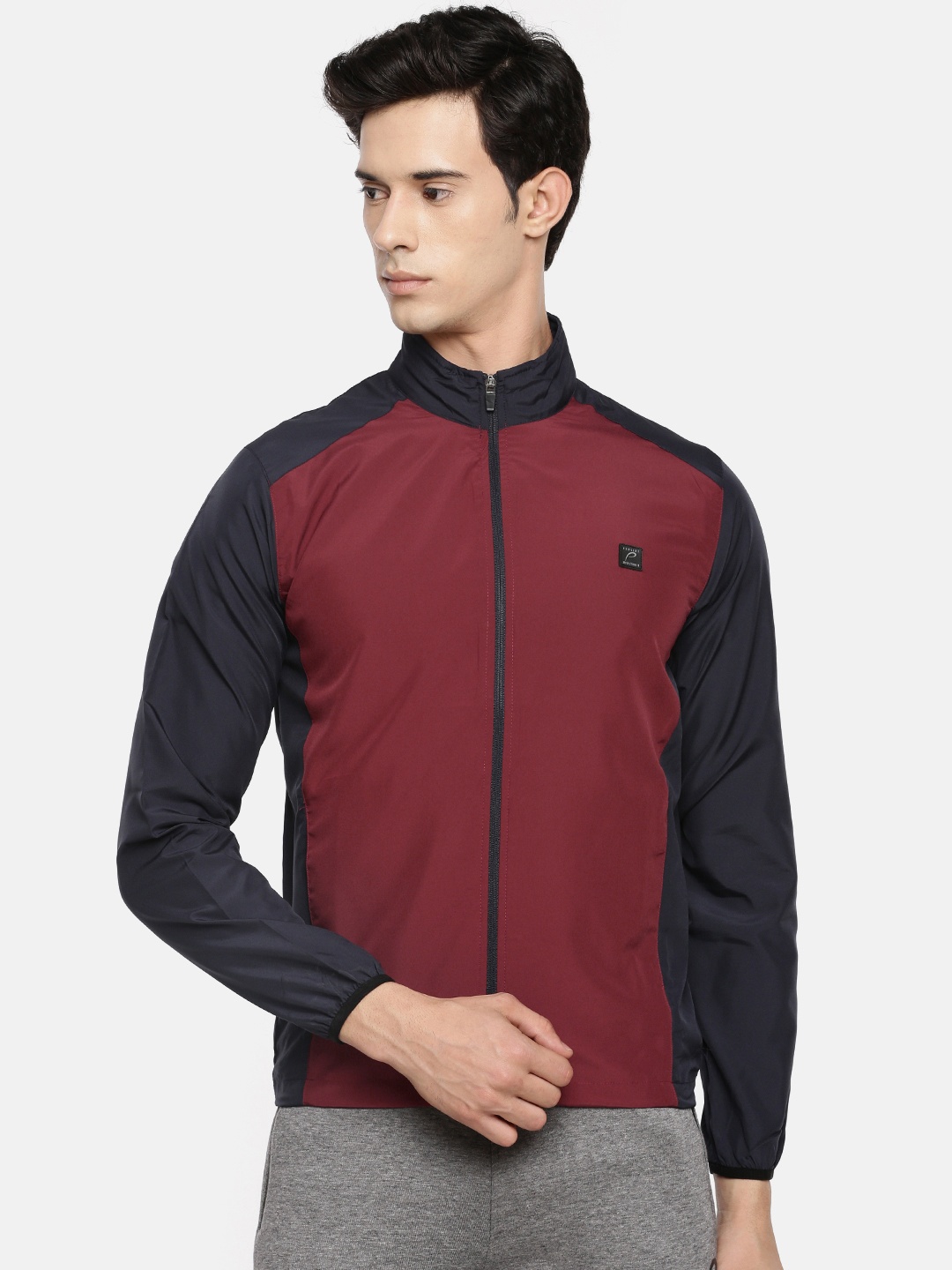 

Proline Active Men Maroon & Navy Colourblocked Windcheater Jacket